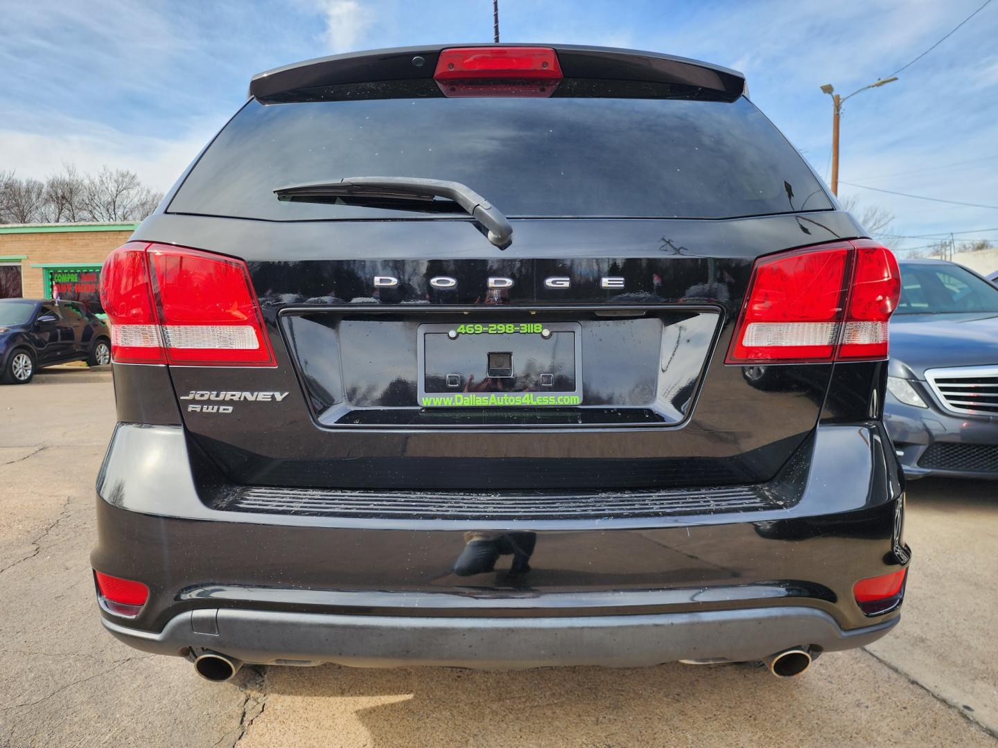 2016 BLACK /BLACK Dodge Journey SXT (3C4PDDBG0GT) with an 3.6L V6 DOHC 24V engine, 6A transmission, located at 2660 S.Garland Avenue, Garland, TX, 75041, (469) 298-3118, 32.885551, -96.655602 - Welcome to DallasAutos4Less, one of the Premier BUY HERE PAY HERE Dealers in the North Dallas Area. We specialize in financing to people with NO CREDIT or BAD CREDIT. We need proof of income, proof of residence, and a ID. Come buy your new car from us today!! This is a SUPER CLEAN 2016 DODGE JOUR - Photo#4